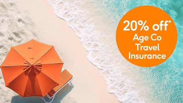 Orange unbrell on the beach with a 20% off roundel