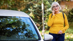 Woman calling for car repair service