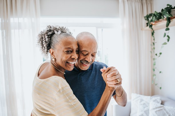 Senior Couple Dancing Together