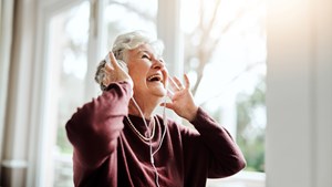 Senior woman listening to music