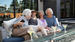 Four women laughing