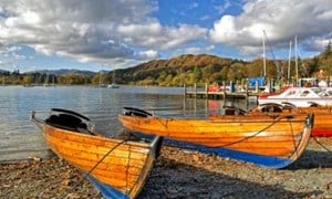 Small wooden boats on a shoreline