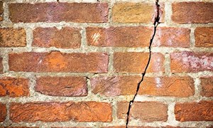 Brick wall with large crack