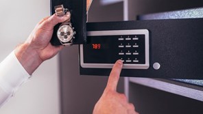 Code being entered into personal safe to store valuables