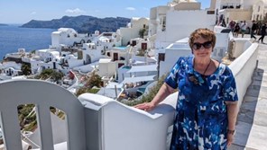 Christina poses for a photo on a Greek island.